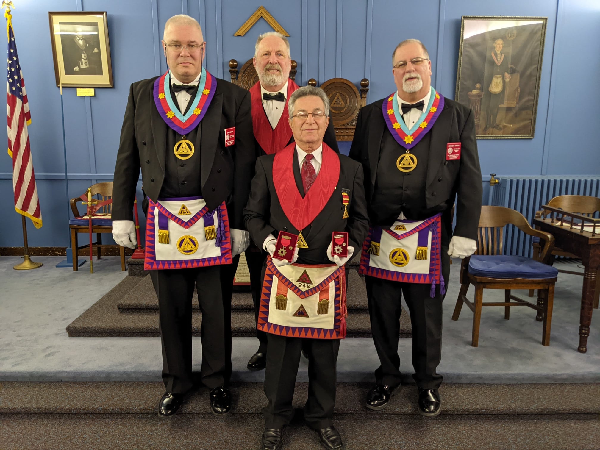 Companion George Avlonitis, PHP, was presented with his Bronze and Silver Triple Triangle Awards. 